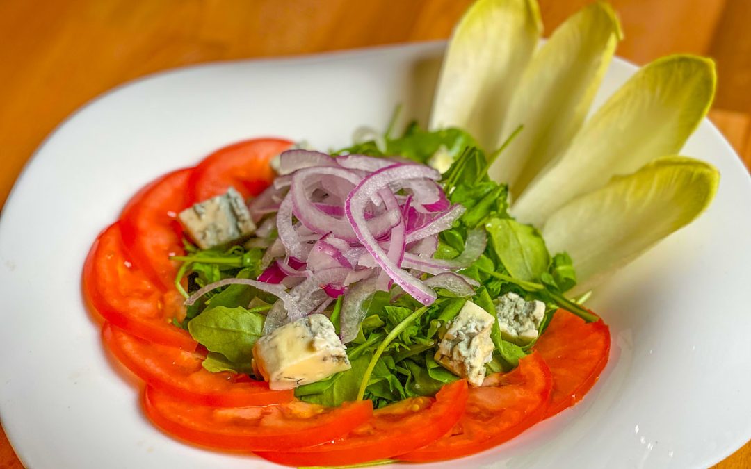 ENSALADA DE RÚCULA “EL PORTEÑO”: frescura y sabor.